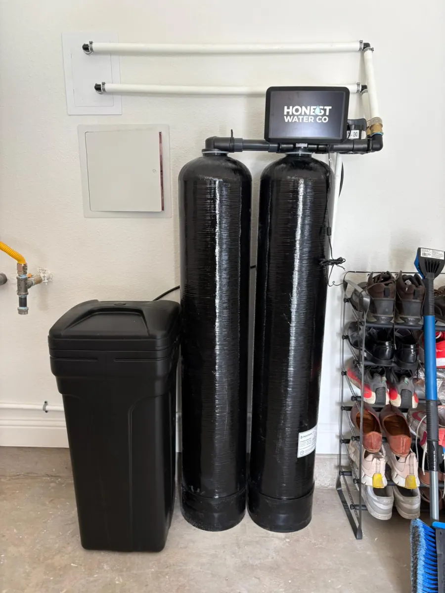 Whole-home softener with bypass valve and brine tank installed in a Suwanee garage