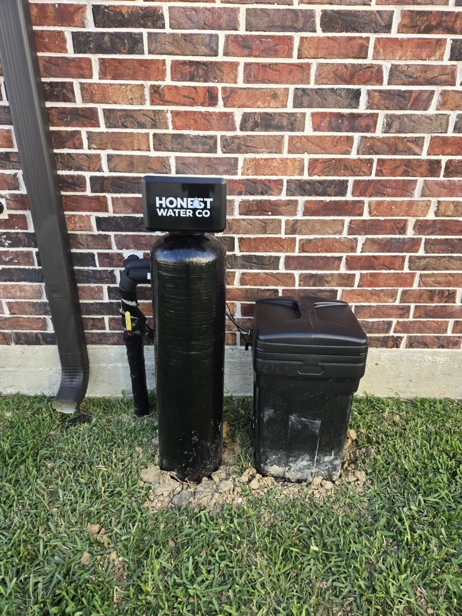 Whole-house water filtration system with leak detection sensor in a Braselton GA basement