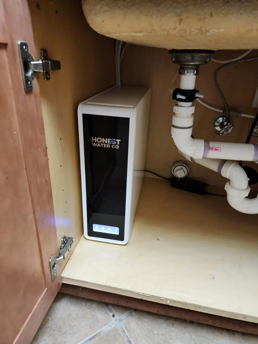 Reverse osmosis tank, membrane, and stages mounted in a Winder GA under-sink cabinet